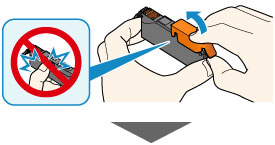 Figure shows orange protective cap being removed